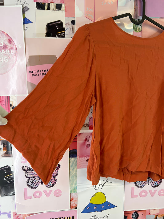 Carin Wester orange top