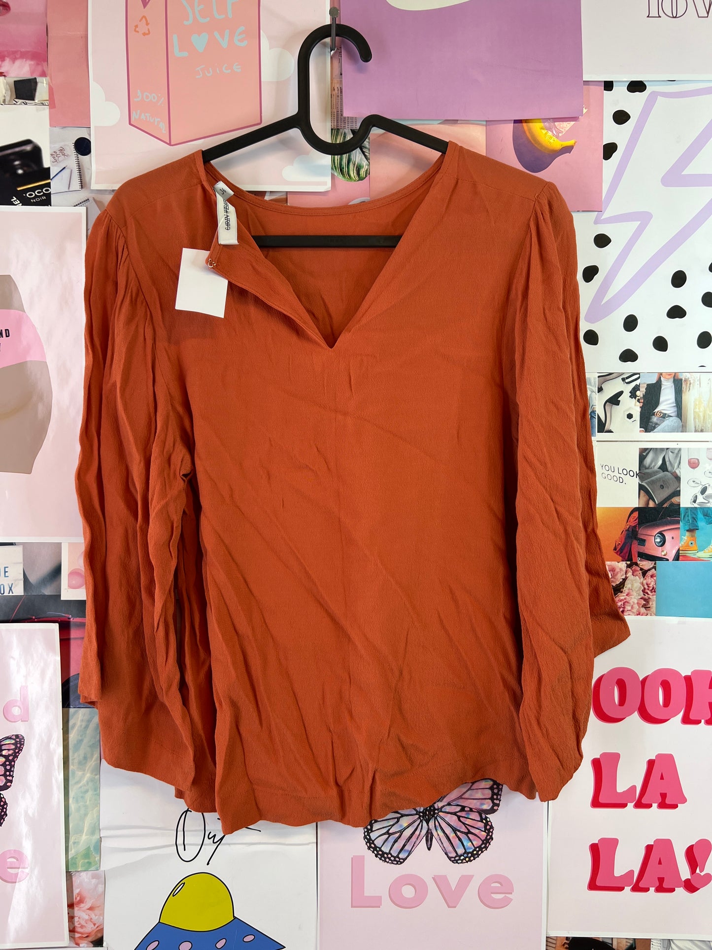 Carin Wester orange top