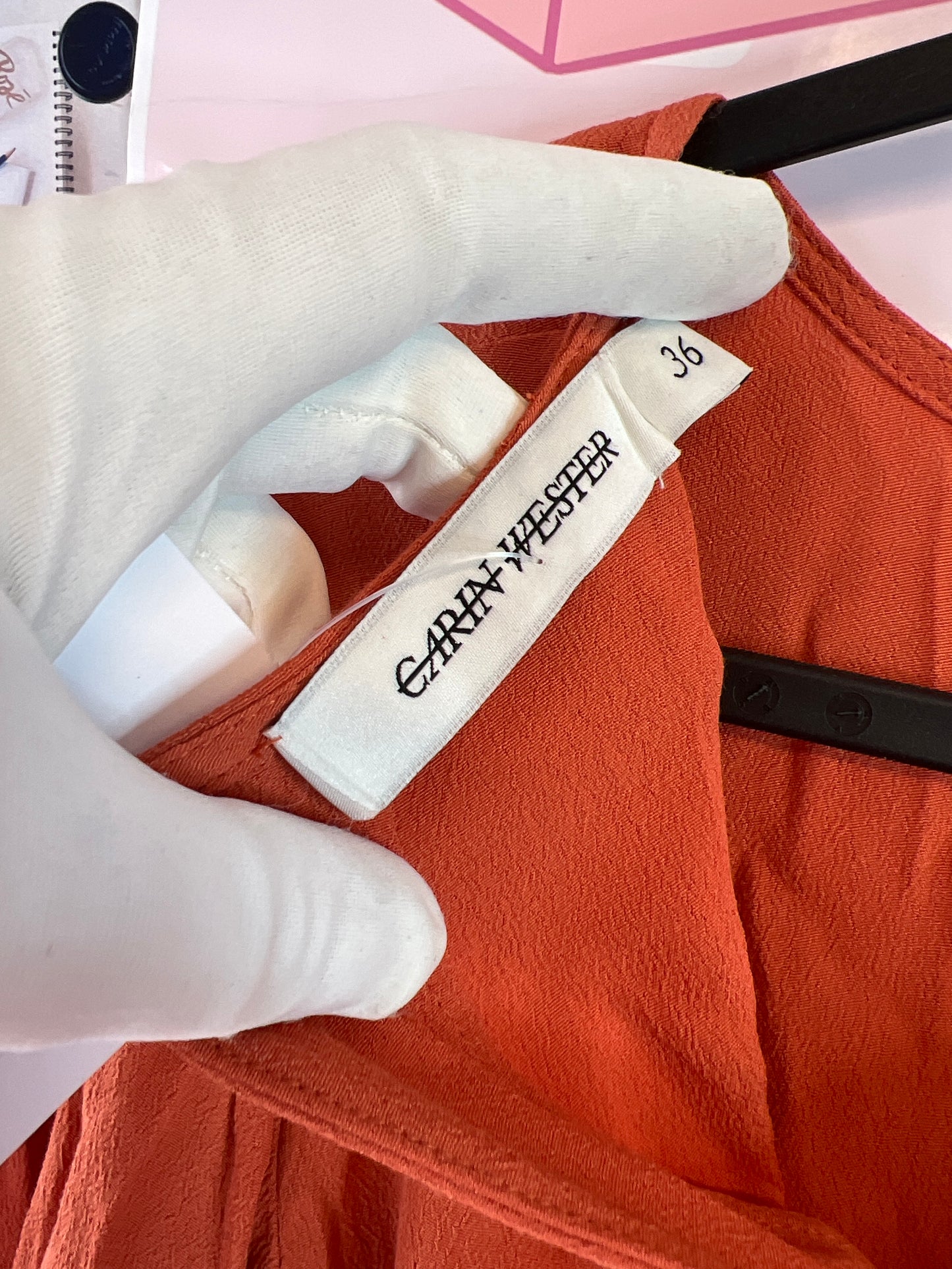 Carin Wester orange top