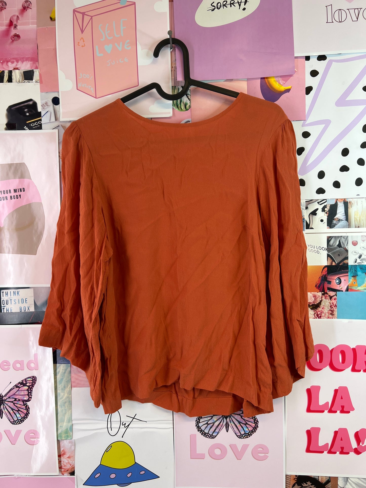 Carin Wester orange top
