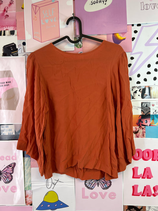 Carin Wester orange top